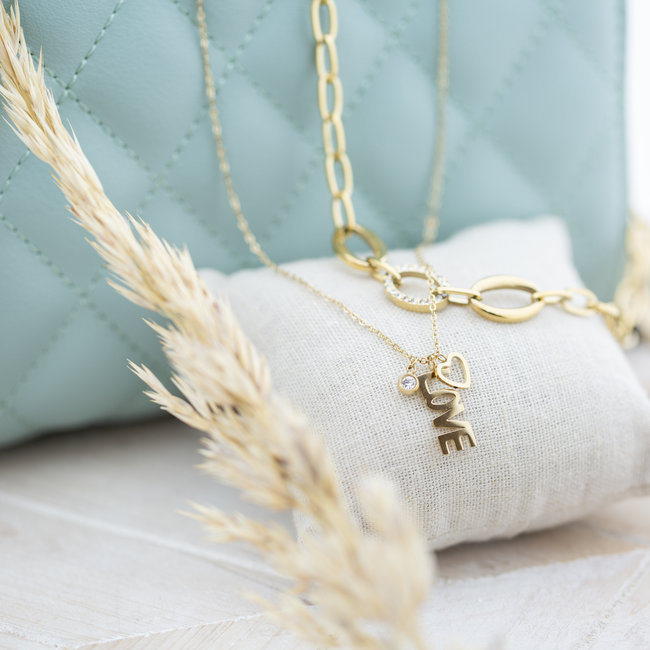 Goud ketting met schakels of love