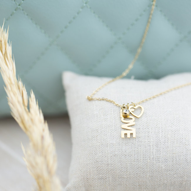 Goud ketting met schakels of love