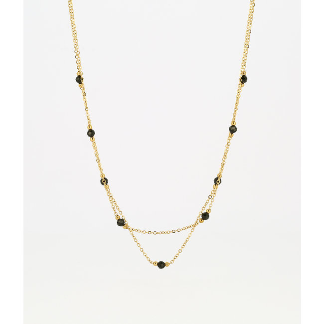 Dubbele goudkleurige ketting met zwarte facetkraaltjes