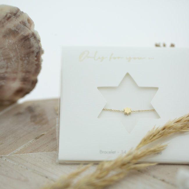 Goud ster armband in leuke verpakking