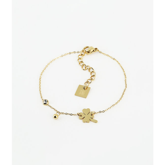 Goud klaver armband en turquoise bolletjes armband