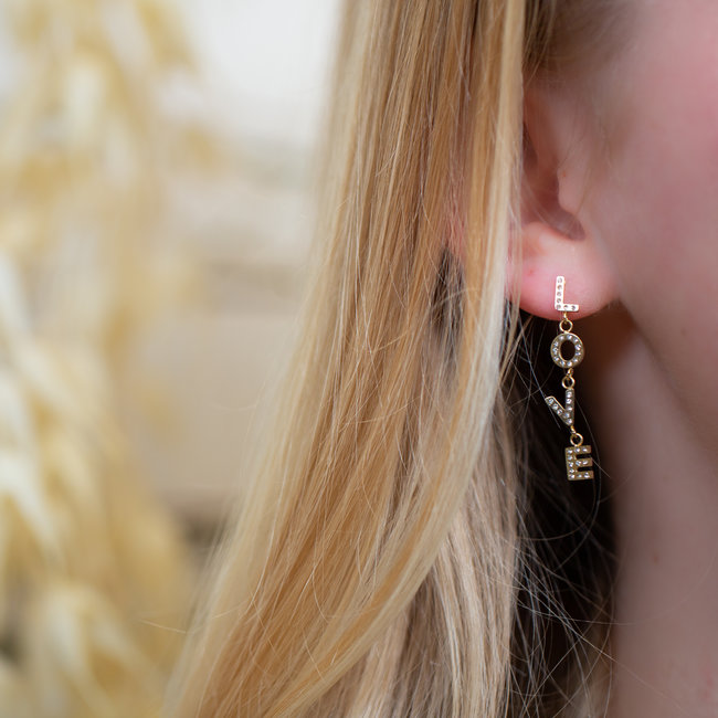 Tekst oorbellen met love