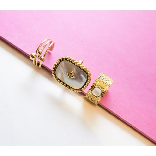 ZAG  Bijoux Goudkleurige ringen met witte steen of klaver