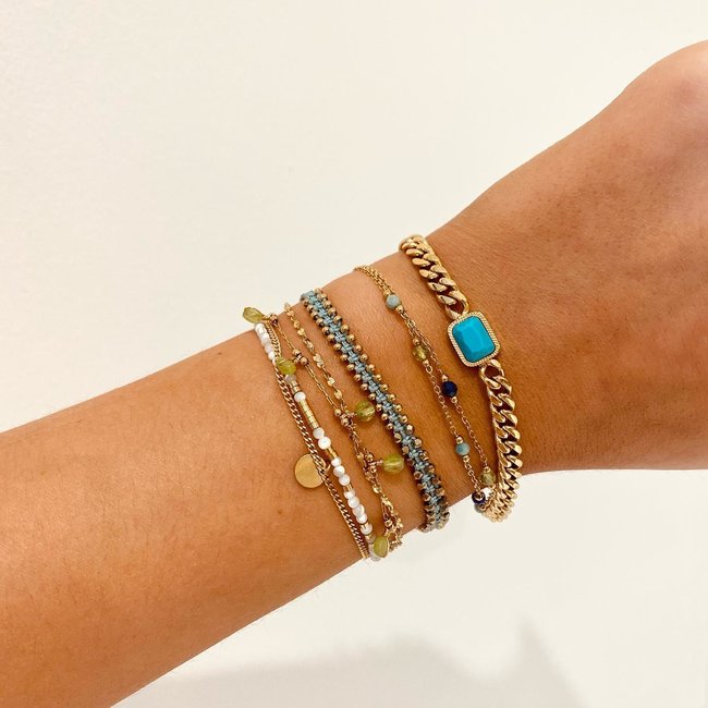 Gouden armband turquoise bedel en hartje