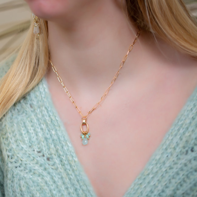 Biba Goud schakelketting met ronde ring  turquoise bedels