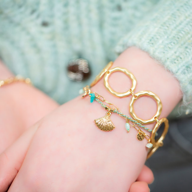 Schakel en schelp armband