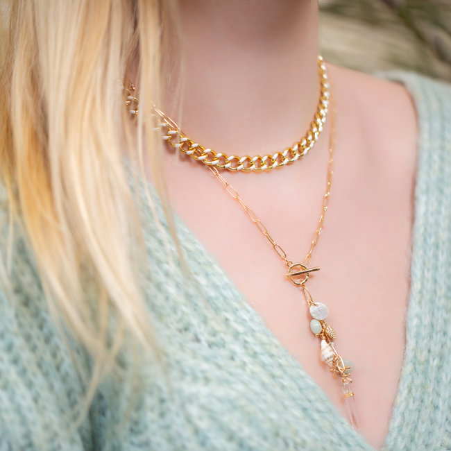 Goud schakelketting met ronde ring  turquoise steentjes zee bedels
