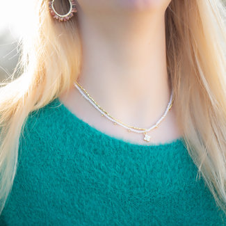 Biba Dubbele witte ketting met bloem Biba Dubbele witte ketting met bloem