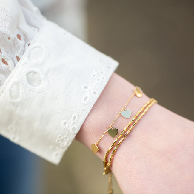 Dubbele armband met schakels of hartjes goud