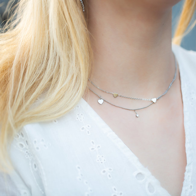 Dubbele ketting met schakels en hartjes zilverkleurig