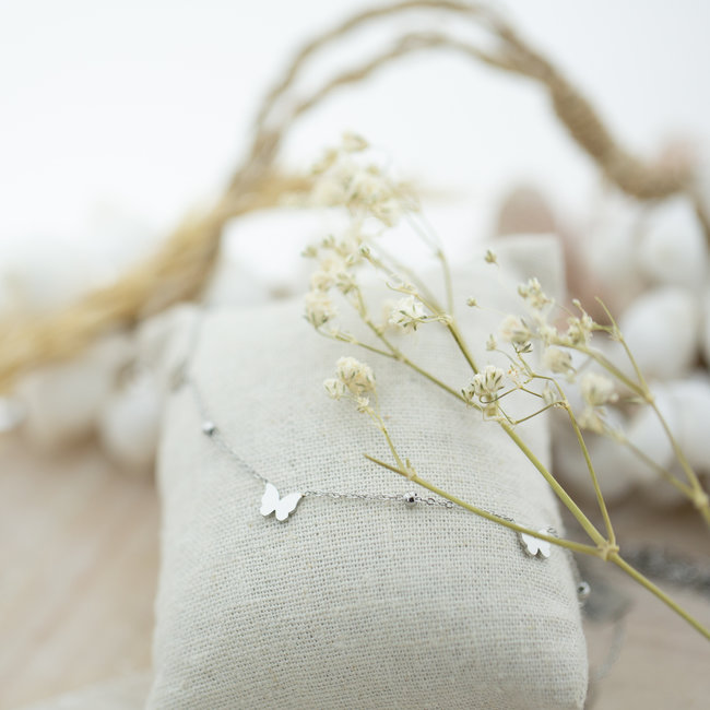 ZAG  Bijoux Zilverkleurige ketting met vlinders en bolletjes