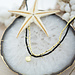 Biba Dubbele zwart goud ketting met schelp