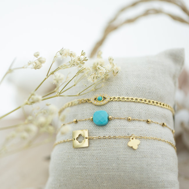 ZAG  Bijoux Turquoise met goud trendy armbandjes met oogje, klaver en steentje