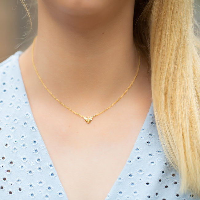 Goudkleurige ketting met bijtje