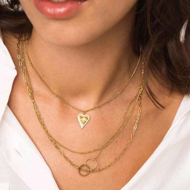 Goud schakelketting met ringen of hart