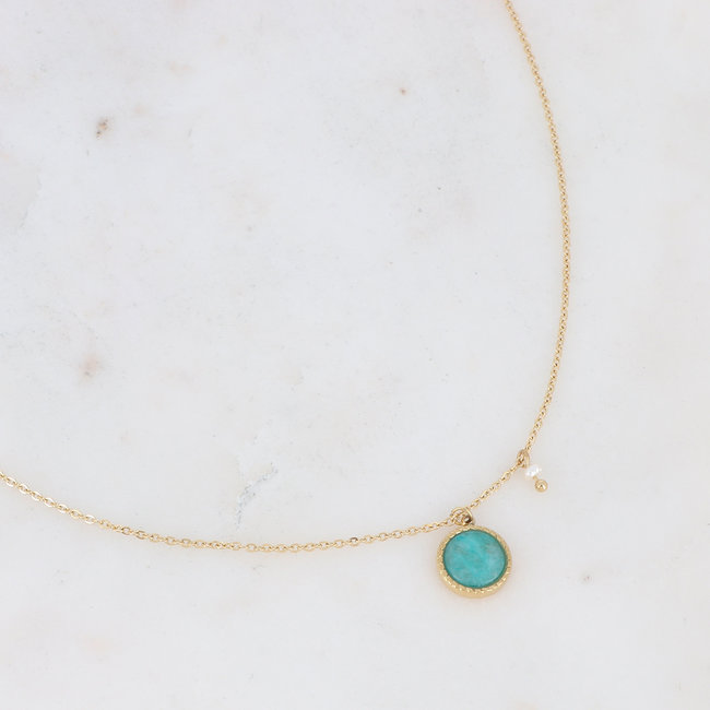 Goud schakelketting met ronde of rechthoek hangers