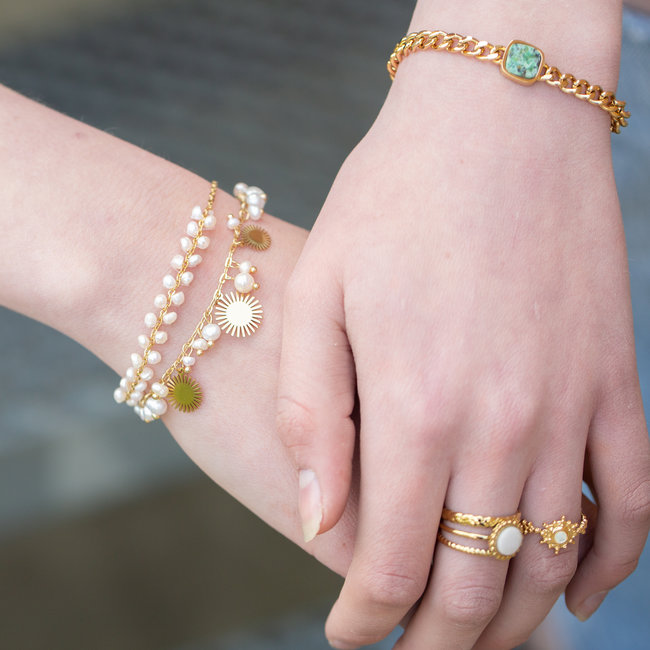 Goud armbanden parel of zon