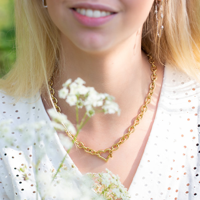 Goud schakelketting met hart