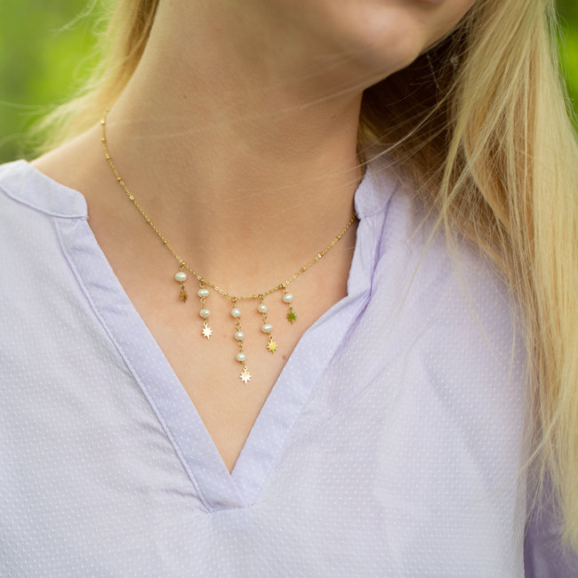 Ikita  Goud ketting met witte parels en sterren
