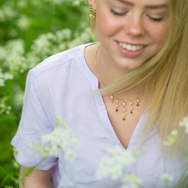 Goud ketting met witte parels en sterren