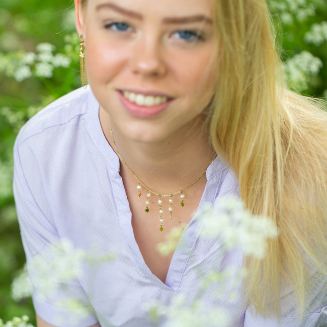 Goud ketting met witte parels en sterren