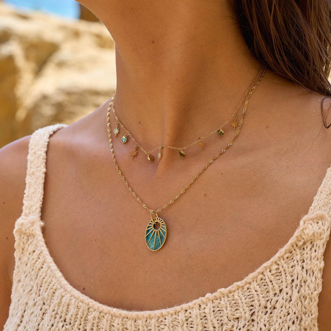 Goud ketting met zonnestralen