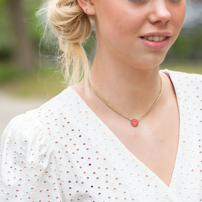 Beadle Ketting met crystal steentjes en roze smiley