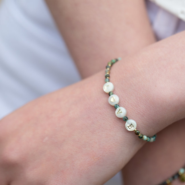 Armband  turquoise met love tekst