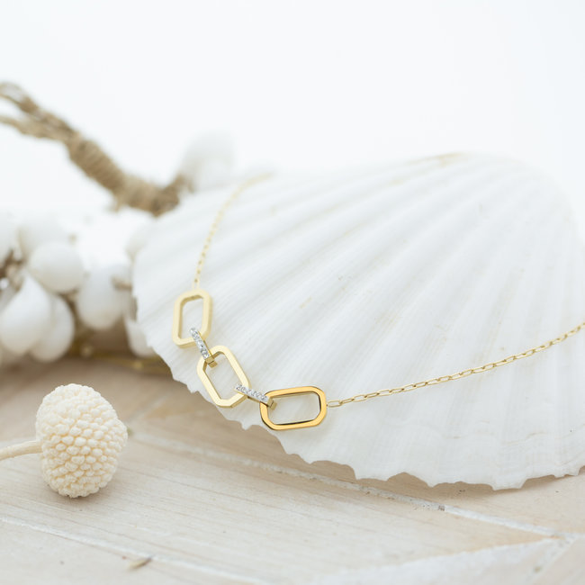 Goud ketting met drie dikke schakels