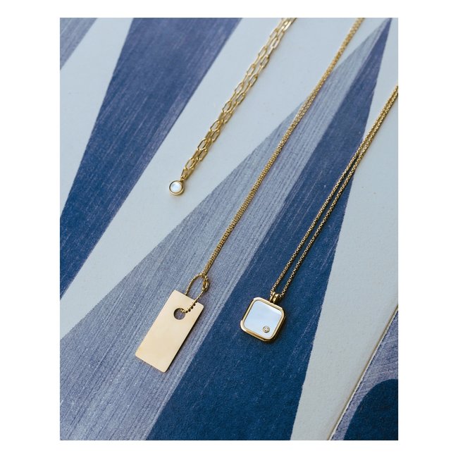 ZAG  Bijoux Goudkleurige ketting met witte parelmoer schelp hanger