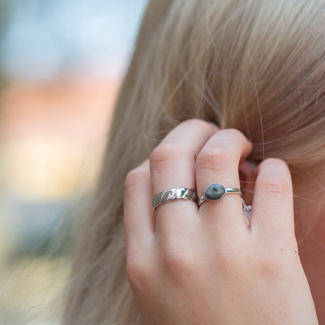 Stalen croissant of steen ring zilver