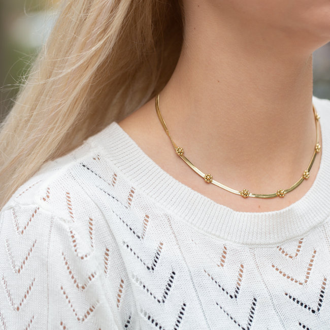 Day & Eve  Platte schakelketting met bloemen goudkleurig