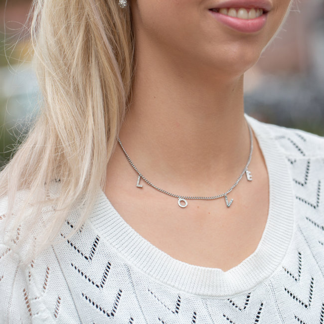 Day & Eve  Zilverkleurige ketting met love