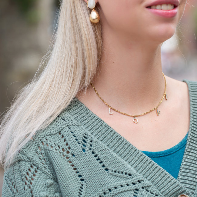 Goudkleurige ketting met love