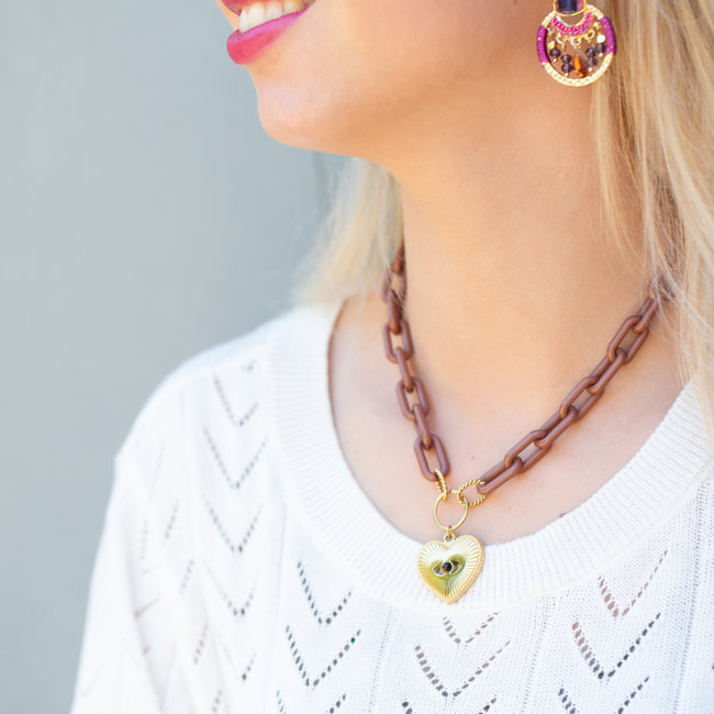 Goud met bruinegroffe schakelketting  en hart
