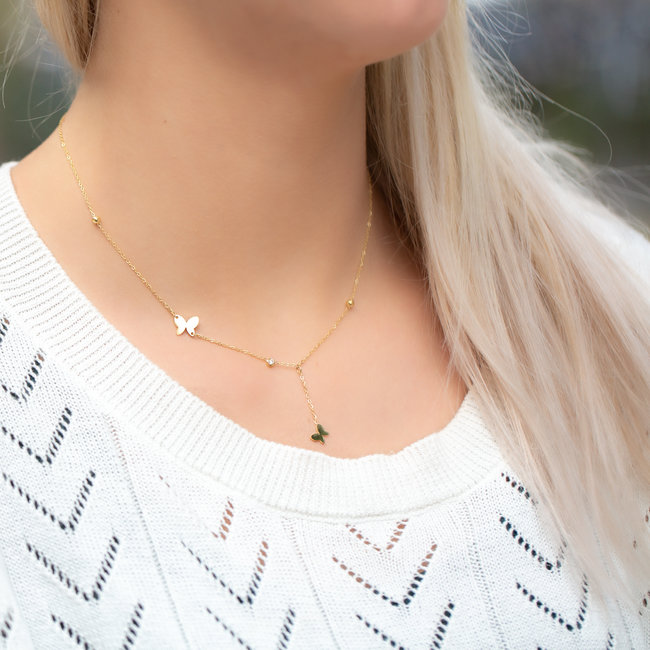 Goudkleurige ketting met vlinders