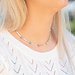 Day & Eve by Go Dutch Label Platte schakelketting met bloemen zilver