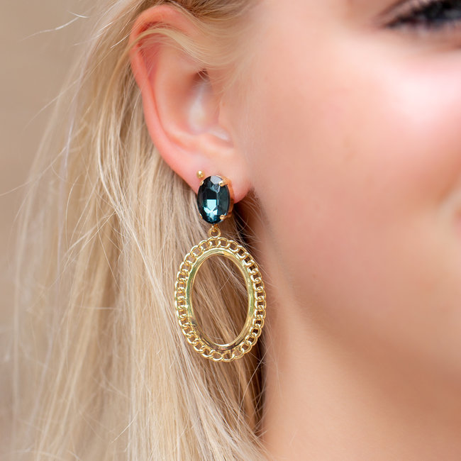 Biba Grote ovaal bewerkte oorbellen met blauwe steen