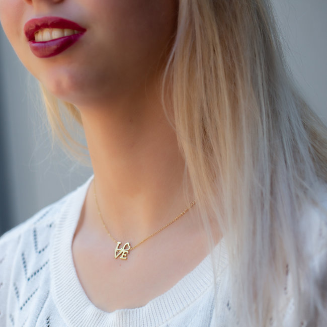 Day & Eve  Goudkleurige ketting met love
