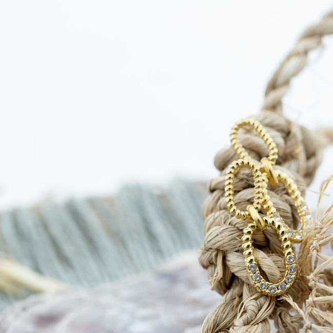 Goud schakel oorbellen met strass steentjes