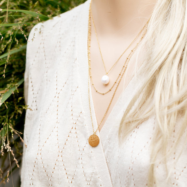 Goud driedubbele ketting met parel