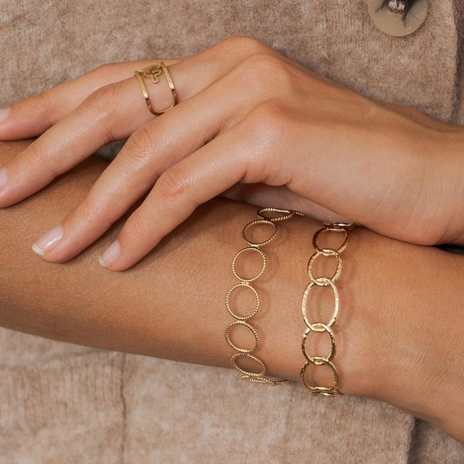 Ikita  Goud armbanden stainless steel zwarte stenen