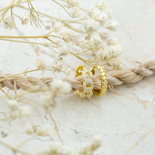 KARMA Goud creolen open of zirconia steentjes