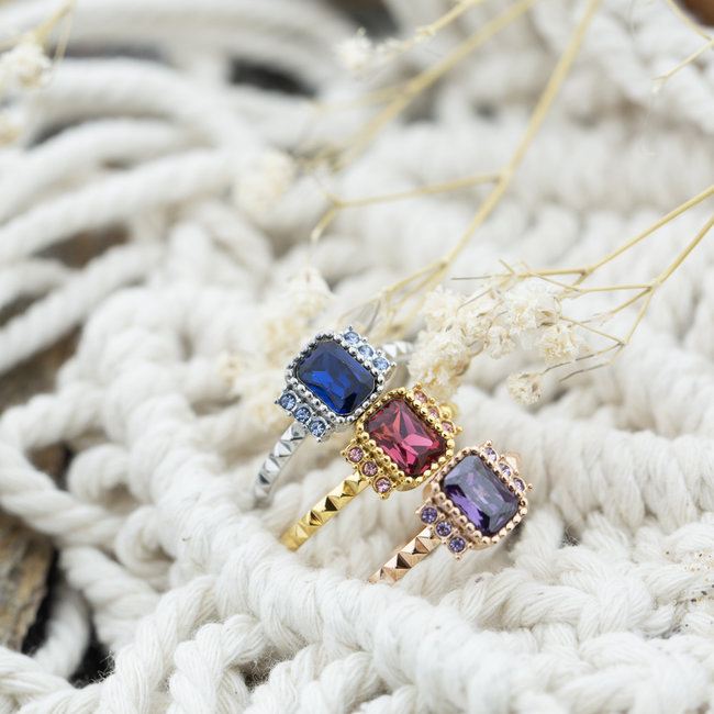 Vulring miracle met rechthoek steen in blauw roze of paars