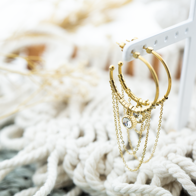 Bijzondere goud oorbellen met crystal en ketting