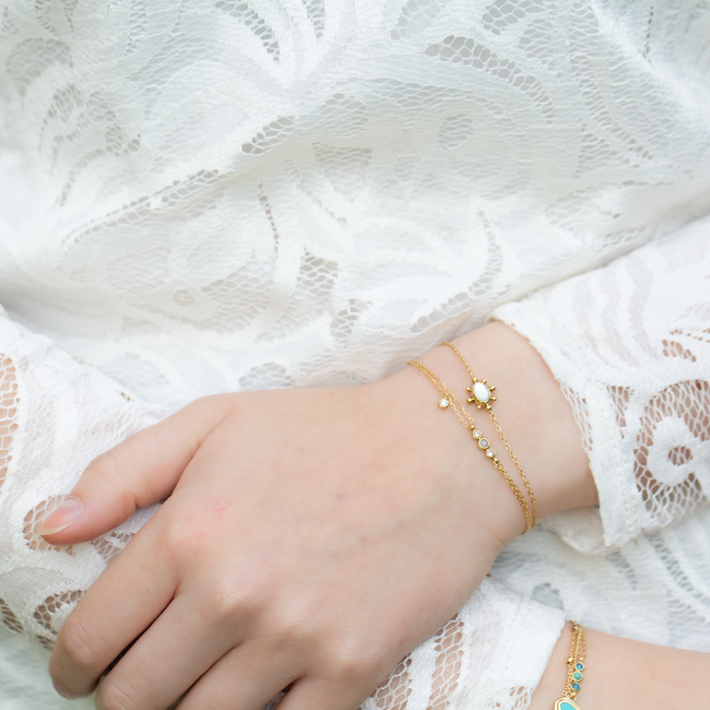 ZAG  Bijoux Goud met wit trendy armbandjes met  crystal steentjes