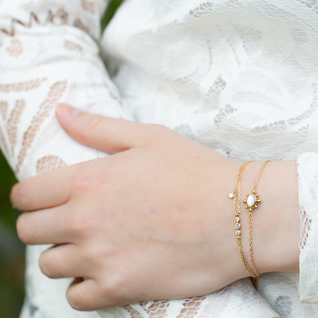 ZAG  Bijoux Goud met wit trendy armbandjes met  crystal steentjes