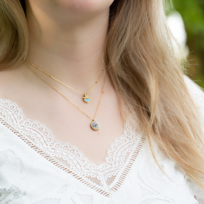 Goud hart of eye love ketting