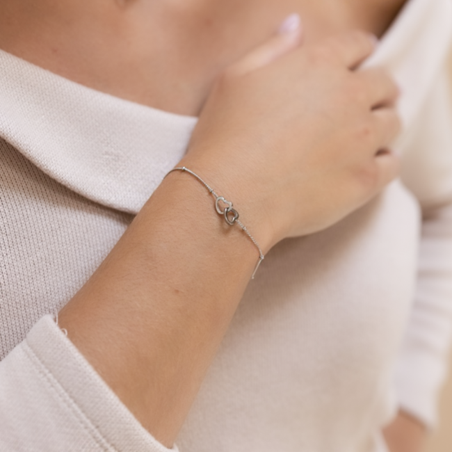 Day & Eve  Stoere zilver schakelarmband of parels en hart