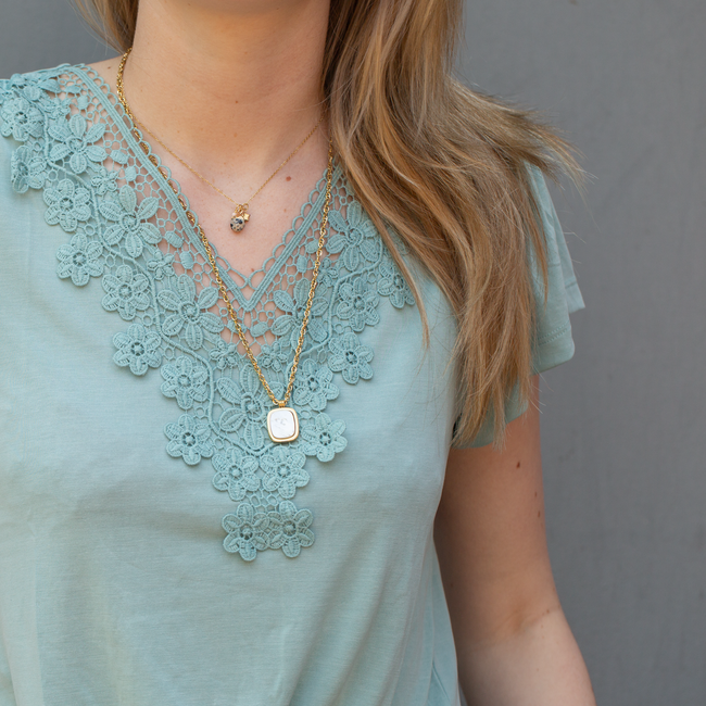 Bohm Paris Goud schakelketting met rechthoek parelmoerbedel of parelmoer ring